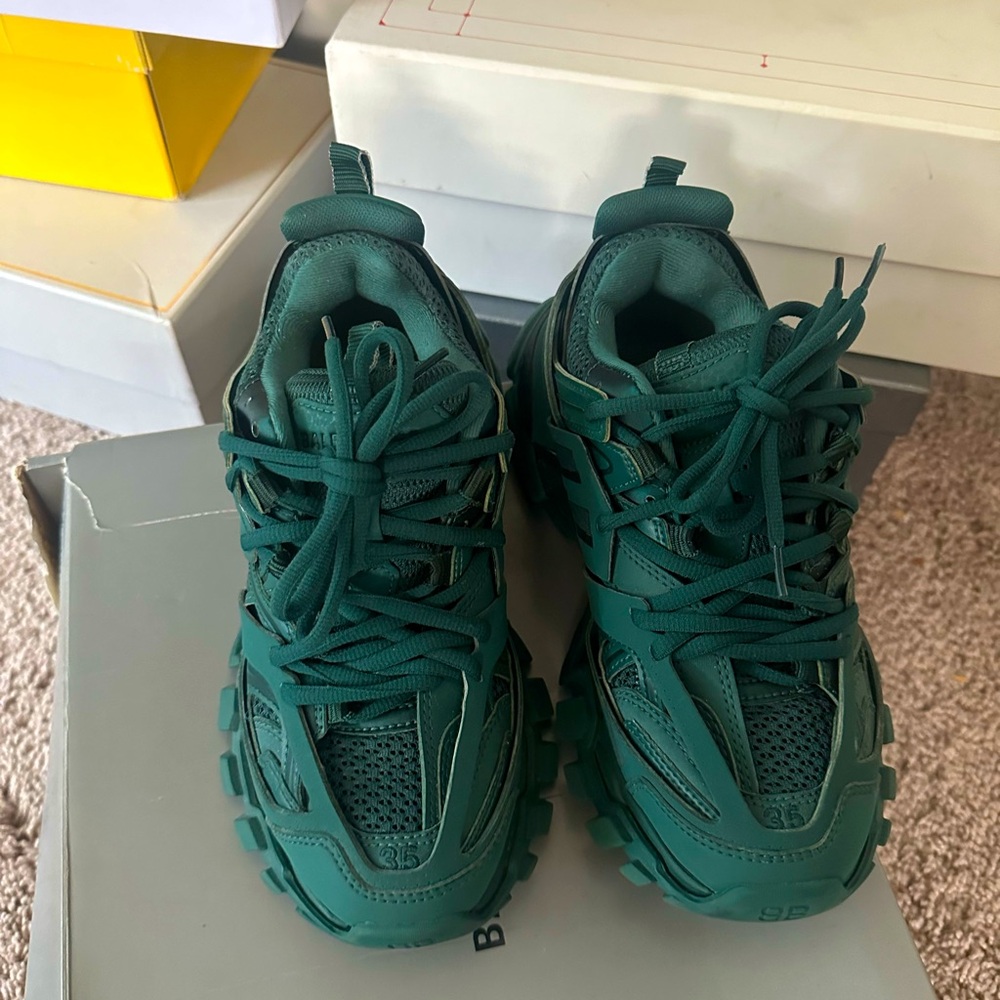 Hunter green Balenciaga trainers women size 35 fairly worn excellent condition.